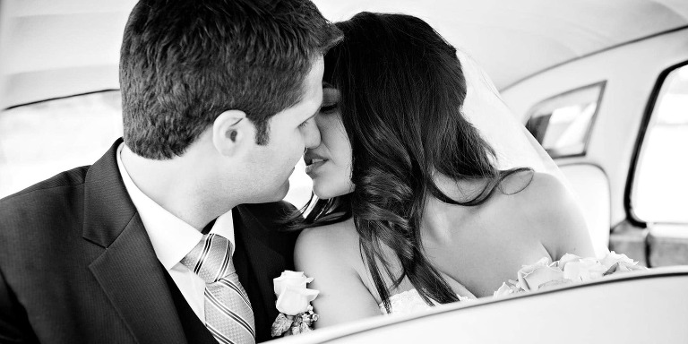wedding couple kissing photo black and white